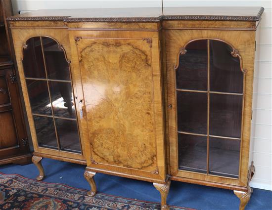 A 1930s walnut breakfront cabinet, W.150cm